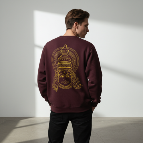 “the divine mask” – kathakali line art sweatshirt coral
