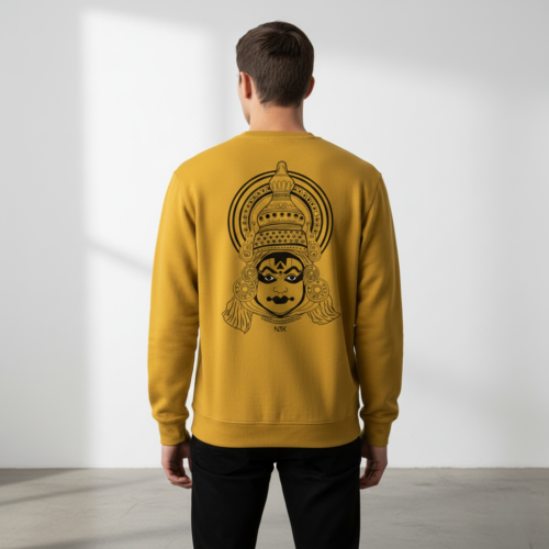 “the divine mask” – kathakali line art sweatshirt coral